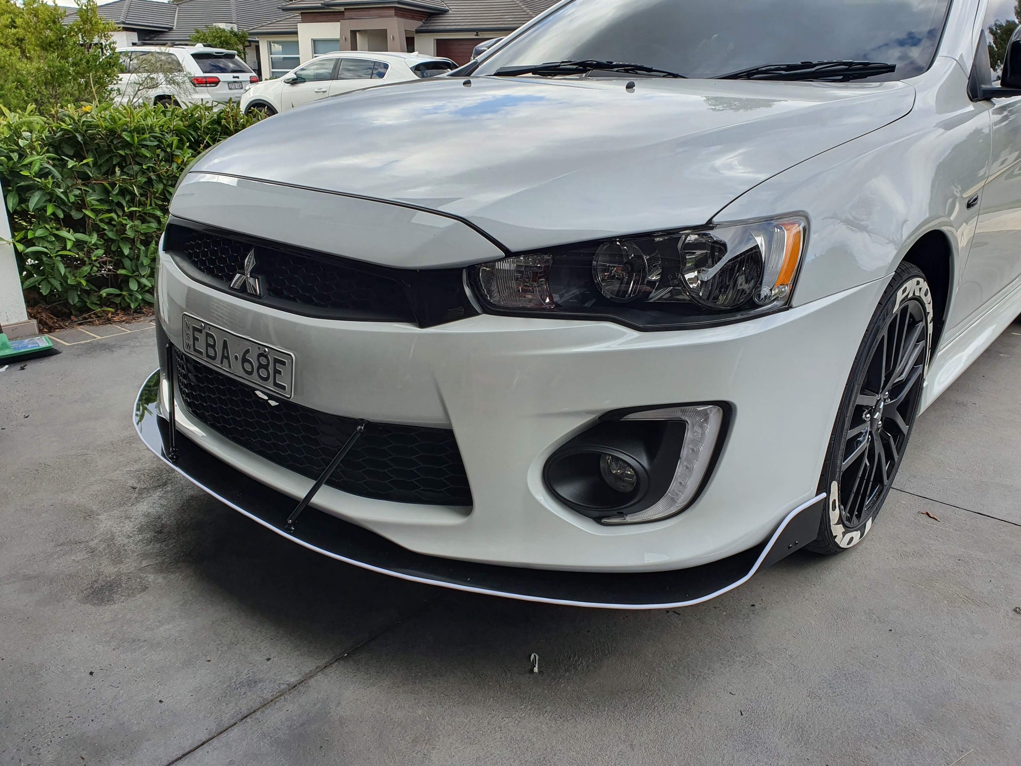 Cf Lancer Mitsubishi CF Lancer Front Splitter V2 – E-Wing Aero Designs